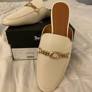 Brand New Coach mules size 8.5